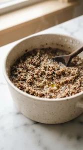 Quinoa simmering in a saucepan for buddha bowl recipe